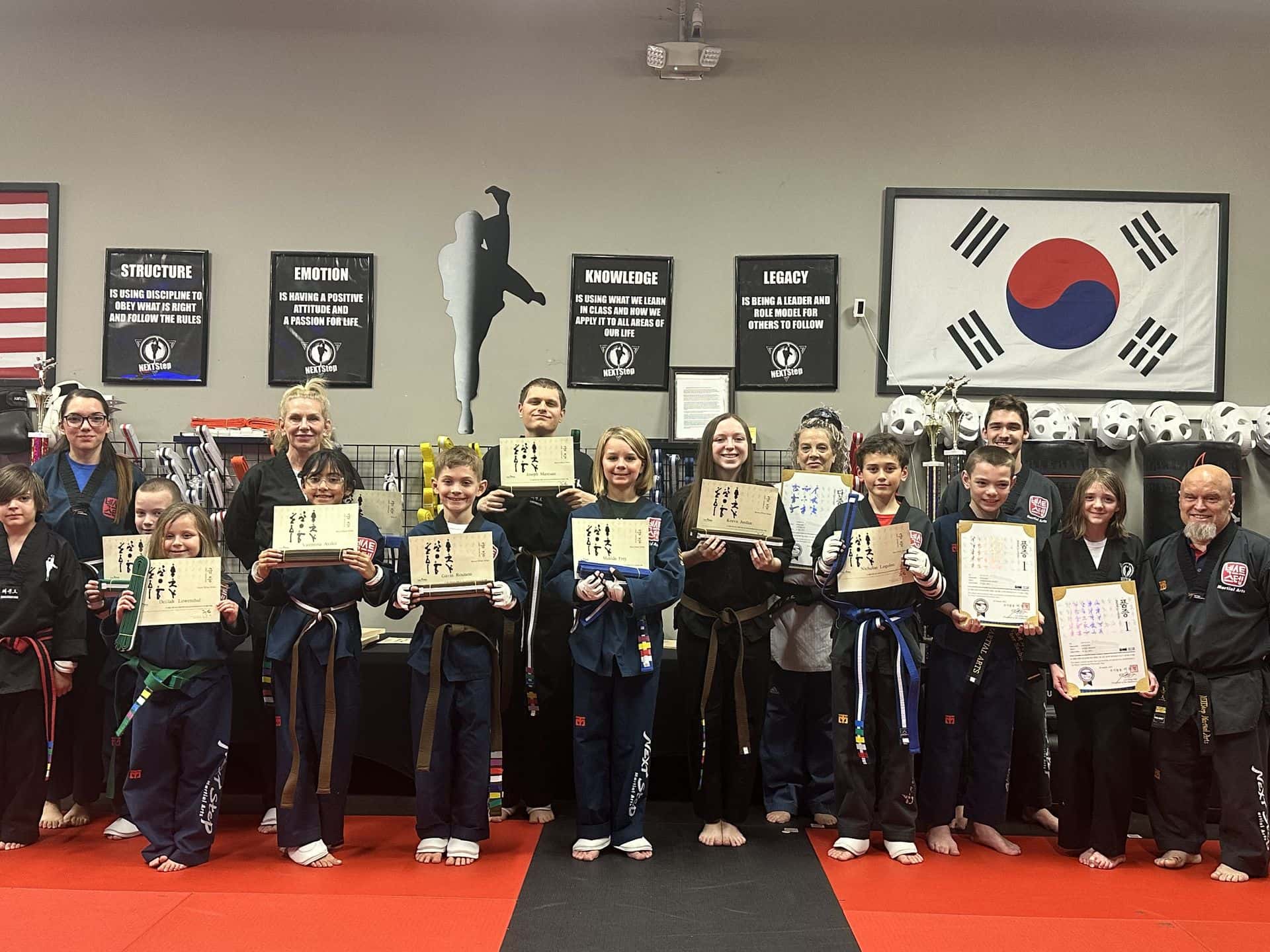 NEXTStep Martial Arts Gettysburg PA — belt test graduates holding certificates